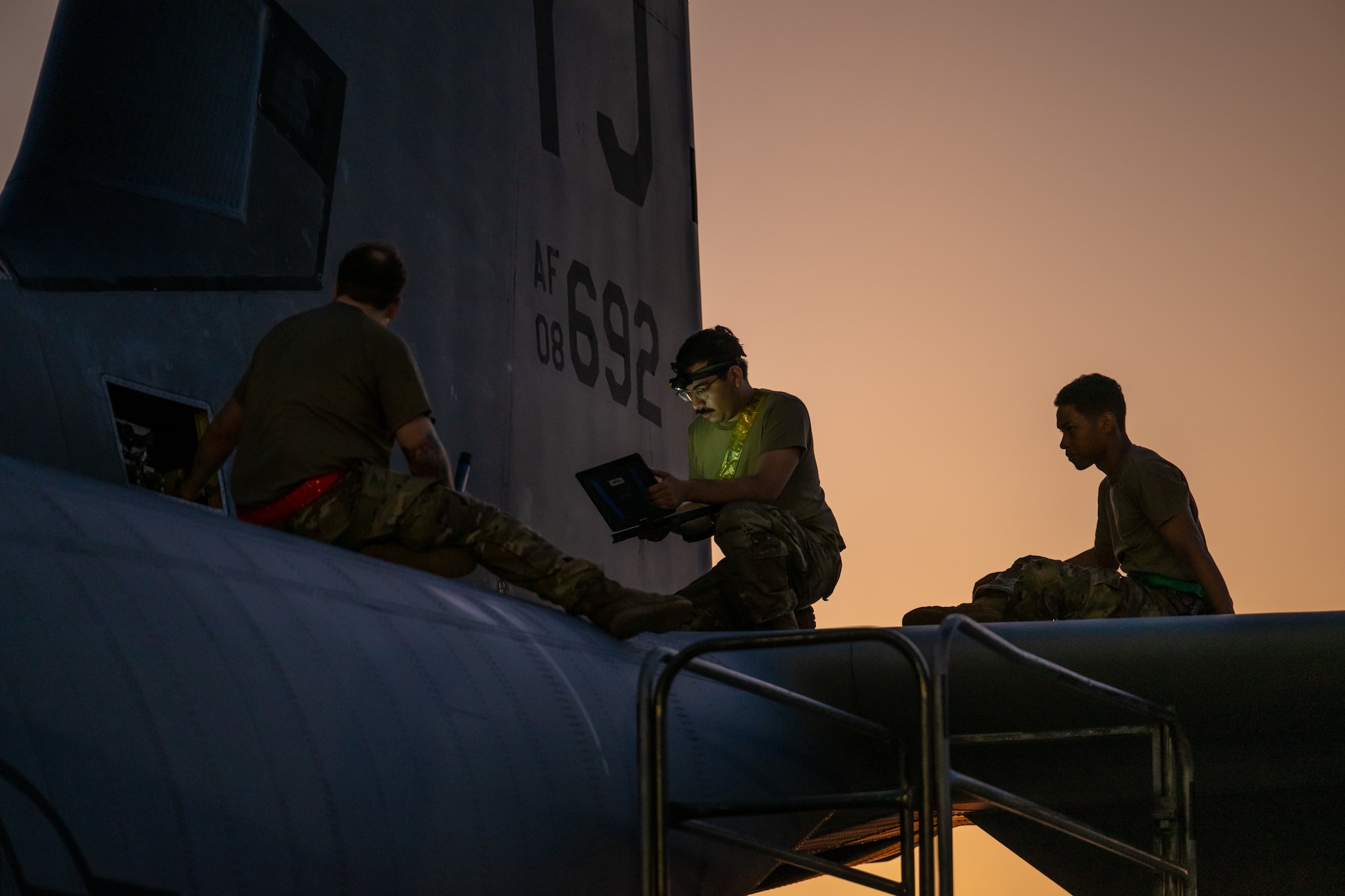 Maintainers with the 374th Maintenance Squadron perform maintenance on a C-130J Super Hercules aircraft assigned to the 374th Air Expeditionary Wing, during Exercise Resolute Force Pacific 2025 at Yokota Air Base, Japan, July 21, 2025.  REFORPAC is part of the first-in-a-generation Department-Level Exercise series, a new way of conducting operations in a contested, dynamic environment to build capabilities making a stronger, more capable deterrent force. The DLE series encompasses all branches of the Department of Defense, along with Allies and partners, employing more than 400 Joint and coalition aircraft and more than 12,000 members at more than 50 locations across 3,000 miles. (U.S. Air Force photo by Tech. Sgt. Nicholas Monteleone)