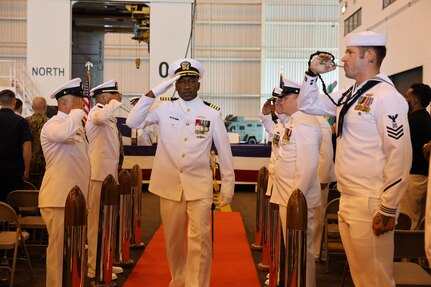 KINGS BAY, GA. (June 18, 2025) – Capt. Gregory Price, commanding officer, Strategic Weapons Facility, Atlantic (SWFLANT), departs a change of command held at the Explosives Handling Wharf onboard Naval Submarine Base Kings Bay, Ga., June 18, 2025. During the ceremony, Price relieved Capt. Juan Hines as commanding officer of SWFLANT. SWFLANT’s mission is to deliver safe, secure and effective sea-based strategic deterrence capabilities to fleet ballistic missile submarines. (U.S. Navy photo by Ashley Berumen)