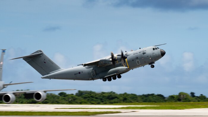 A Royal Air Force A400M Atlas aircraft assigned to the RAF Air Mobility Force takes flight as part of the U.S. Air Force's first-in-a-generation 2025 Department-Level Exercise series at Andersen Air Force Base, Guam, July 17, 2025. During the DLE, the RAF joined the U.S. Air Force and other allies, including the Royal Australian Air Force, Royal New Zealand Air Force, Royal Canadian Air Force, Japan Air Self-Defense Force, and Republic of Korea Air Force, in exercising their airlift and aeromedical evacuation capabilities. The DLE encompasses all branches of the Department of Defense, Allies, and partners, employing more than 400 joint and coalition aircraft and more than 12,000 personnel across more than 50 locations spanning 3,000 miles. (U.S. Air Force photo by Senior Airman Jade M. Caldwell)
