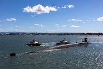 BRISBANE, Australia (July 27, 2025) – The Ohio-class guided-missile submarine USS Ohio (SSGN 726) prepares to moor alongside the forward-deployed submarine tender USS Frank Cable (AS 40) in Brisbane, Australia, for a scheduled port visit July 27, 2025. Ohio and Frank Cable are in port Brisbane, Australia, as part of routine operations in support of the U.S. 7th Fleet, the U.S. Navy’s largest forward-deployed numbered fleet, operating with allies and partners in preserving a free and open Indo-Pacific region. (U.S. Navy photo by Mass Communication Specialist 3rd Class Haley Wilson)