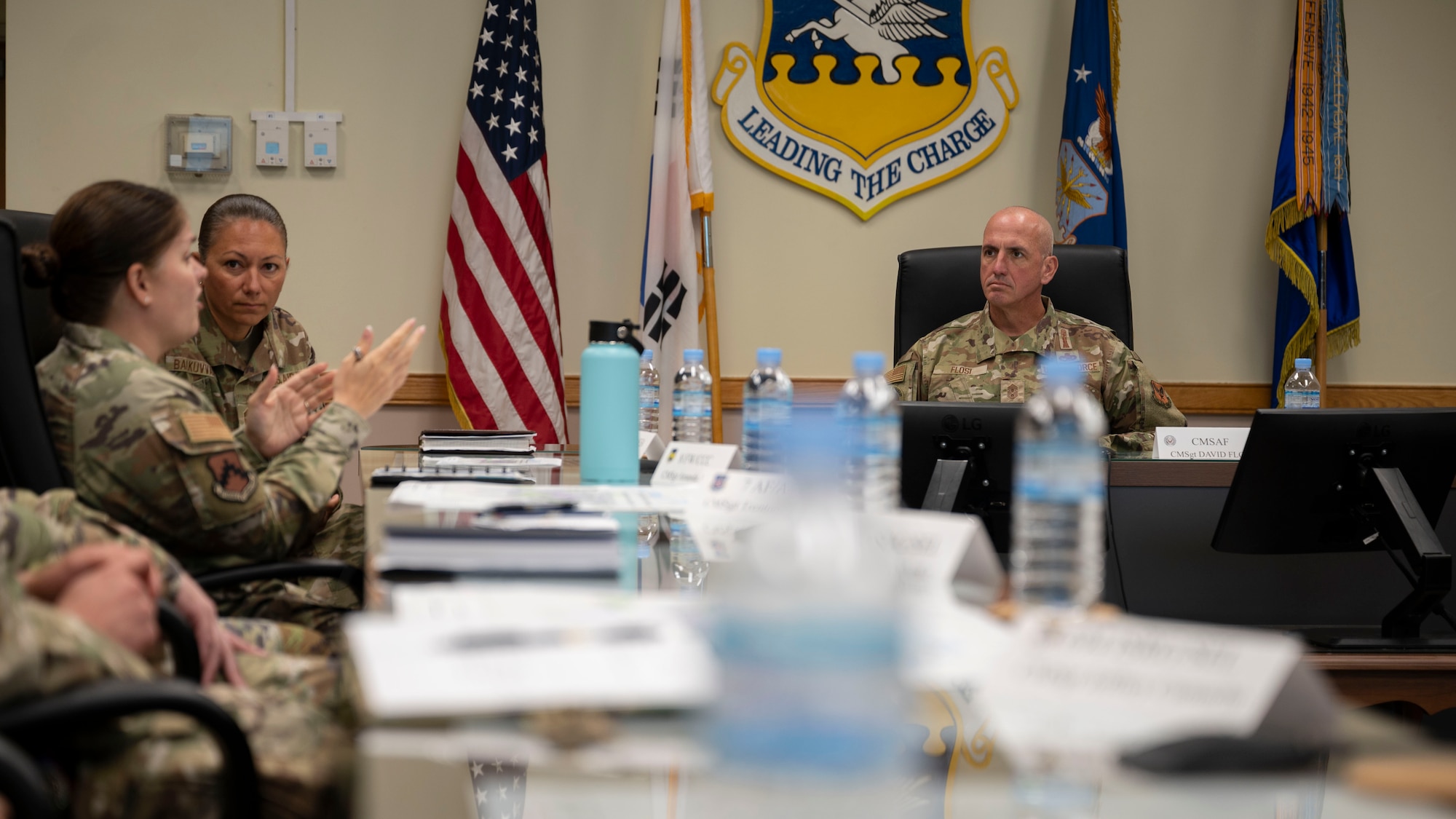 Chief Master Sgt. of the Air Force David Flosi, right, listens to Chief Master Sgt. Amanda Aaron, left, 8th Fighter Wing command chief, at Osan Air Base, Republic of Korea, July 25, 2025. During the meeting, Flosi met with command chiefs and senior enlisted leaders to discuss the 51st Fighter Wing mission, the future of the Air Force, and Osan’s critical role in regional security and Indo-Pacific stability. (U.S. Air Force photo by Senior Airman Rome Bowermaster)