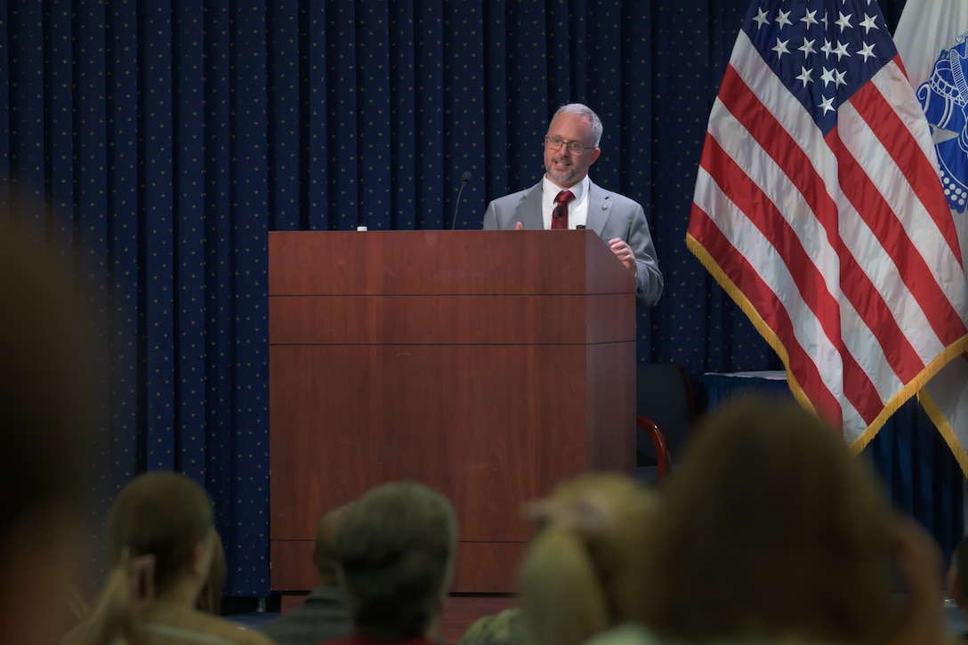 Deputy Assistant Secretary of State for Global Operations Seth Green speaks to Defense Logistics Agency employees about the State Department Logistics Framework and the support his organization receives from the agency at Fort Belvoir, Virginia, July 17, 2025.