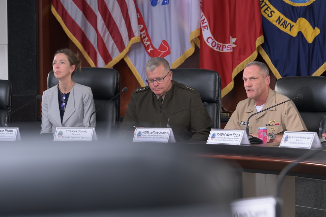 Deputy Chief of Naval Operations for Installations and Logistics Navy Vice Adm. Jeffrey Jablon, right, provides opening remarks during the Navy/DLA Service Integration Day in the McNamara Headquarters Complex at Fort Belvoir, Virginia, July 2, 2025.