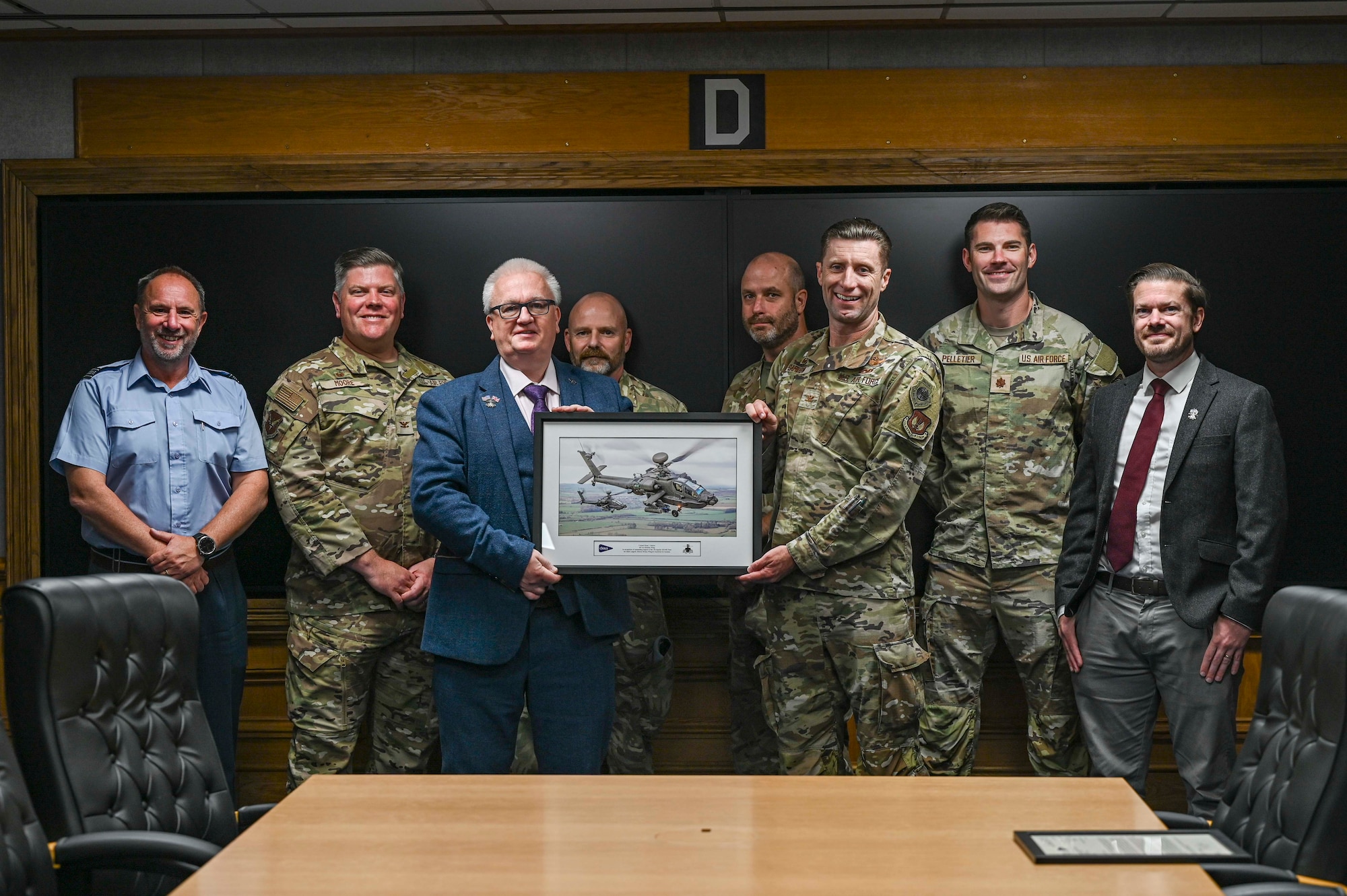 The AH-64E Apaches were transported from the U.S. to England in an effort to strengthen the British Army Air Corps attack helicopter force.