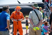 Jon Huggins, 1st Reconnaissance Squadron U-2 instructor pilot, talks with Experimental Aircraft Association AirVenture Oshkosh attendees in Oshkosh, Wisconsin, July 20, 2025.