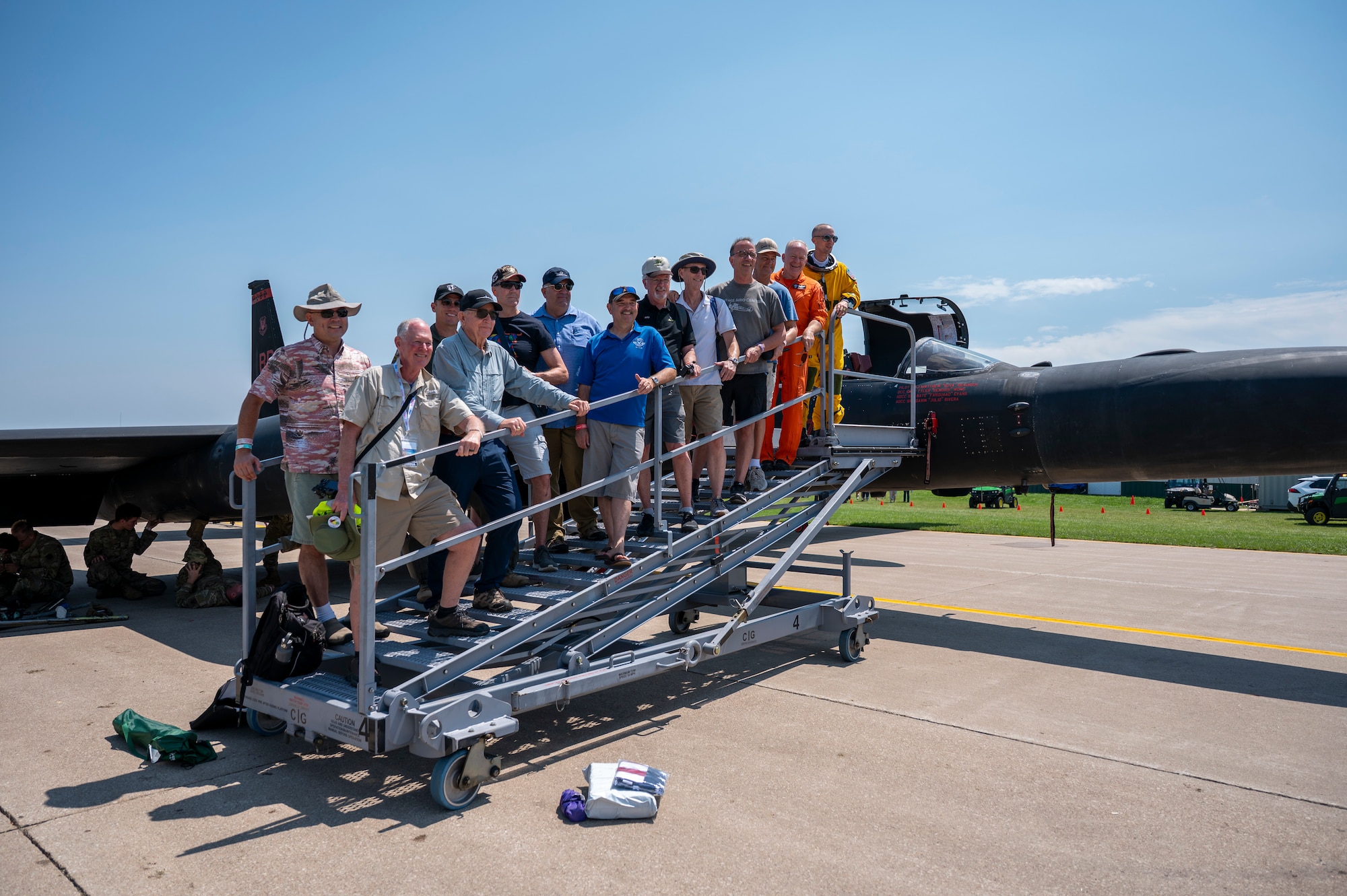 Past and present U-2 Dragon Lady pilots pose for a photo in front of a U-2 at Oshkosh, Wisconsin, July 20, 2025.