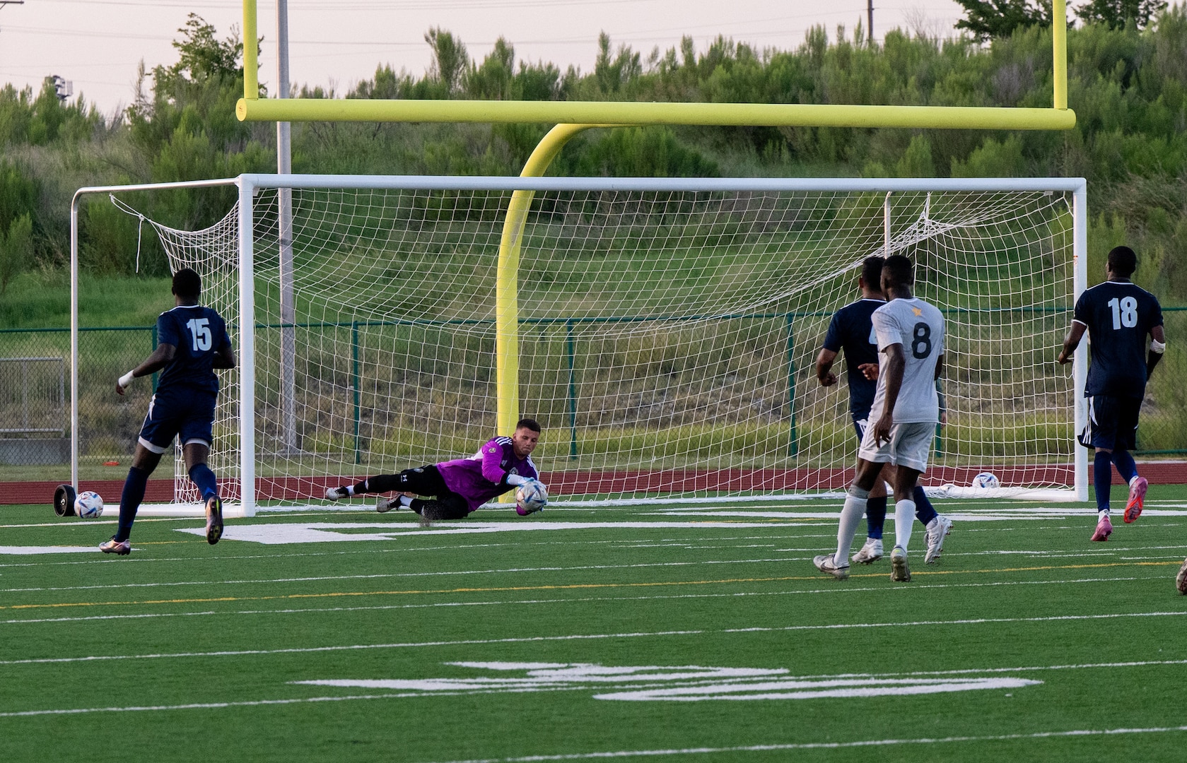 U.S. Navy Lt. j. g. Zachary King blocks the ball from going into the goal during the Armed Forces Men’s Soccer Championship in Phantom Warrior Stadium, Fort Hood, Texas, on July 28, 2025. Each team faces off in a bracket to determine which service will hold the championship title, featuring teams from the Army, Navy, and Air Force. (U.S. Army photo by Sgt. Tien Dat Ngo)