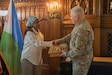 Colonel Amina Mohamed Moussa of the Djiboutian Armed Forces presents a gift to Maj. Gen. Haldane Lamberton, adjutant general of Kentucky, during a key leader engagement in Frankfort, Kentucky, July 23, 2025. The gesture highlighted the mutual respect and ongoing partnership between Kentucky and Djibouti through the State Partnership Program. (U.S. Army National Guard photo by Sgt. Jose Pena)