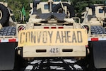 Soldiers with the 1670th Transportation Company prepare for a multi-state convoy as part of Operation Patriot Press on July 13, 2025, at Fort McClellan, Alabama. Operation Patriot Press is an annual exercise conducted by the Army Materiel Command (AMC) that integrates National Guard, Reserve, and Active Duty forces to sharpen nationwide transport capabilities and increase cargo movement efficiency across the country.