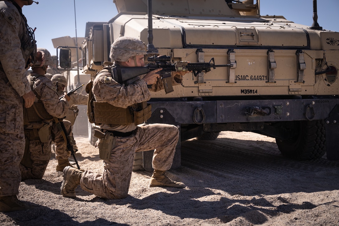 U.S. Marine Corps Cpl. Logan Smith, fire team leader with 4th Law Enforcement Battalion, Force Headquarters Group, posts security at Integrated Training Exercise 3-25 (ITX 3-25) at Marine Corps Air Ground Combat Center, Twentynine Palms, California, June 10th, 2025. ITX is a critical Marine Air-Ground Task Force exercise for the Marine Forces Reserve’s training cycle, confirming unit readiness through live-fire and combined arms integration. (U.S. Marine Corps photo by Lance Cpl. Edward Spears)