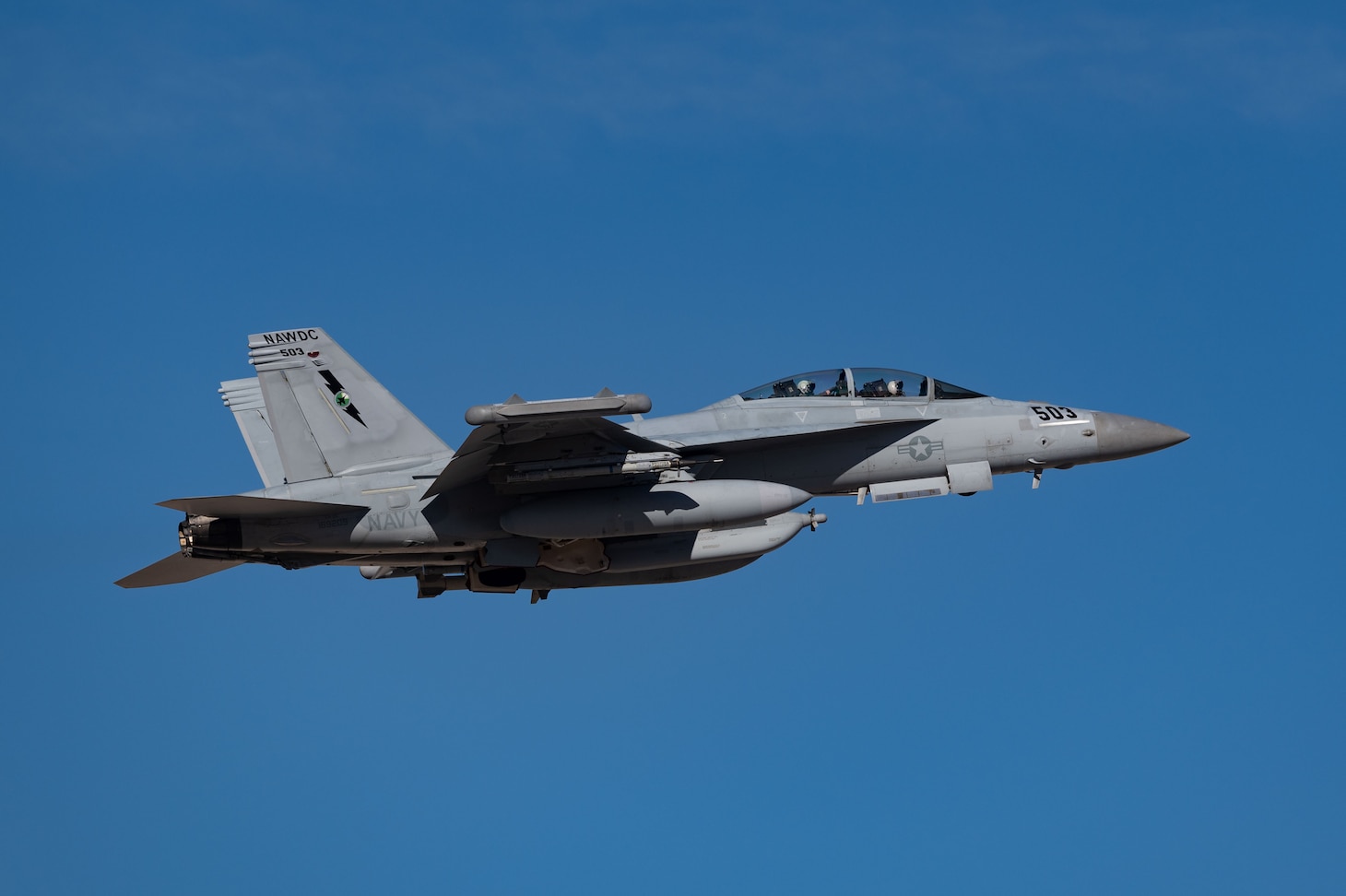 A U.S. Navy EA-18G Growler assigned to Naval Aviation Warfighting Development Center, Naval Air Station Fallon, Nevada, takes off for a Weapons School Integration mission at Nellis Air Force Base, Nevada, Nov. 21, 2024. The EA-18G is a variant in the F/A-18 family of aircraft that combines the proven F/A-18F Super Hornet platform with a sophisticated electronic warfare suite.