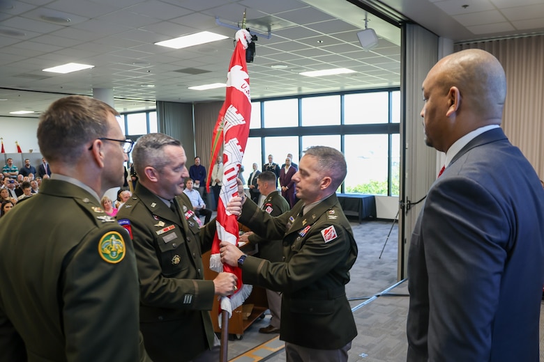 U.S. Army Corps of Engineers (USACE) Southwestern Division Commander Brig. Gen. George Walter (left of center) passes the USACE Galveston District's colors to the incoming District Commander Col. David W. Dake, during a change of command ceremony, July 29, 2025.

During Army change of command ceremonies, the passing of the colors from the senior commander to the incoming commander signifies the passing of his trust and confidence in the incoming commander's ability to lead the organization, its Soldier, and civilians.

U.S. Army photo by Luke Waack