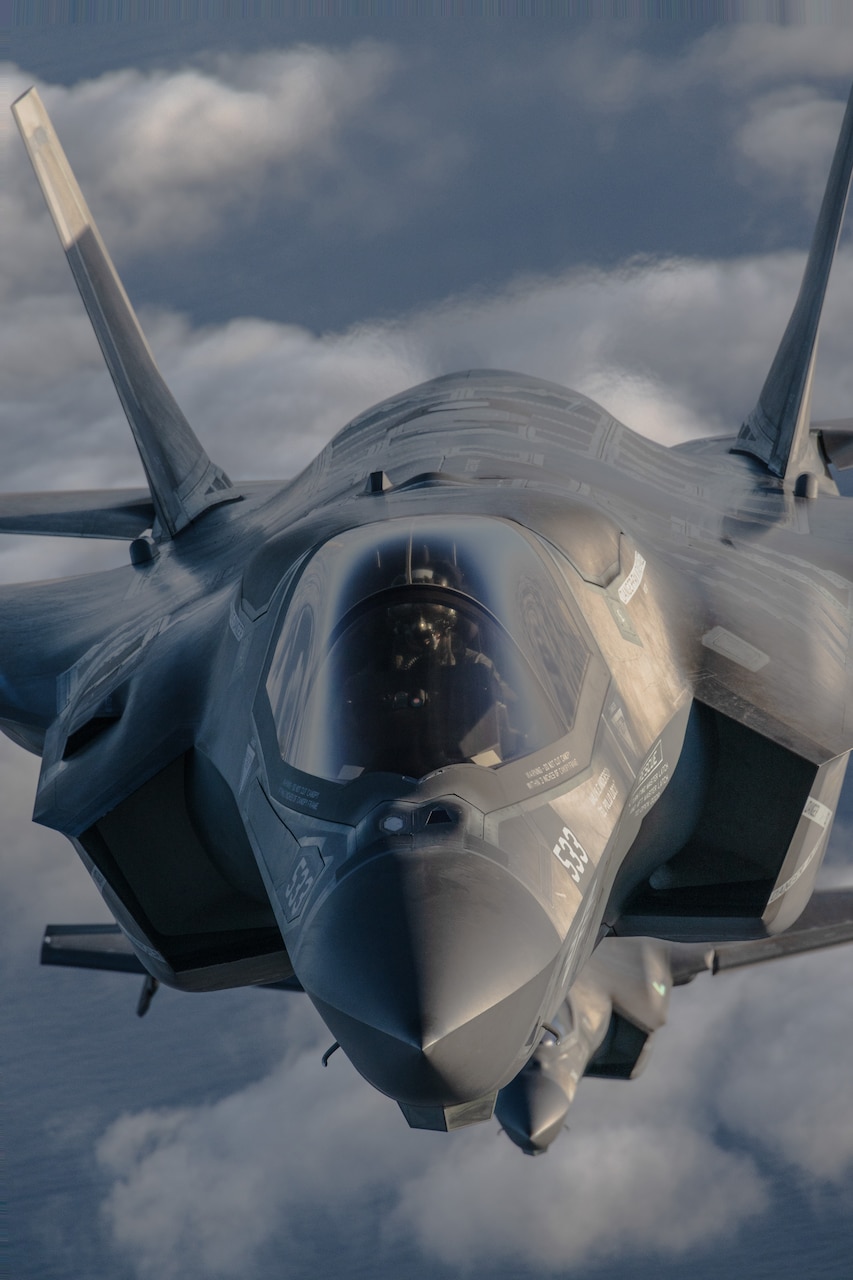 A U.S. Marine Corps F-35B Lightning II assigned to Marine Fighter Attack Training Squadron (VMFAT) 502, Marine Aircraft Group 11, 3rd Marine Aircraft Wing, prepares to enter a formation as part of Project Legacy off the coast of San Diego, March 4, 2025. The Project Legacy flight was a unique opportunity for all aircraft platforms across MAG-11 to fly as one team, practice tight formations, and take part in the documentation of a historical flight.