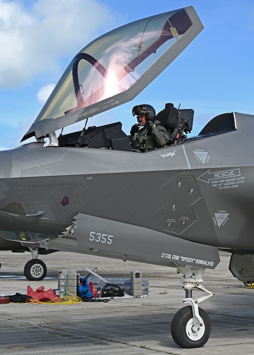 U.S. Air Force Lt. Col. Erik Gonsalves, 355th Mission Generation Force Element commander, fastens his helmet before a flight during exercise Resolute Force Pacific 2025, July 17, 2025.