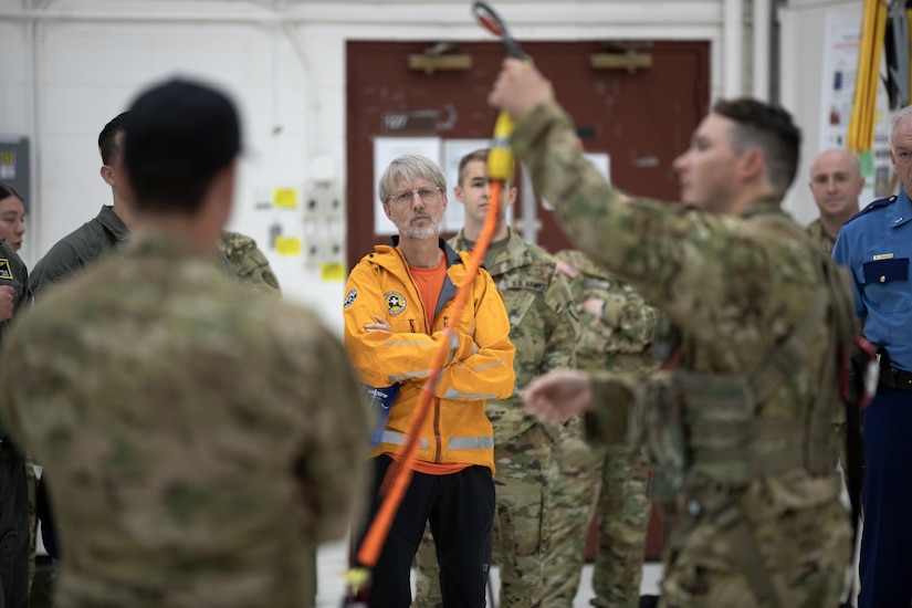 The symposium, hosted by Alaska Army National Guard aviators assigned to Golf Company, 2-211th General Support Aviation Battalion, included U.S. Coast Guard crews assigned to Sector Western Alaska and U.S. Arctic out of Air Stations Kodiak and Sitka, Alaska Air National Guardsmen with the 176th Wing rescue squadrons, U.S. Army aviators from Fort Wainwright’s 1-52nd General Support Aviation Battalion, Alaska State Troopers, and civilian search and rescue professional volunteers from the Alaska Mountain Rescue Group.
