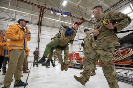The symposium, hosted by Alaska Army National Guard aviators assigned to Golf Company, 2-211th General Support Aviation Battalion, included U.S. Coast Guard crews assigned to Sector Western Alaska and U.S. Arctic out of Air Stations Kodiak and Sitka, Alaska Air National Guardsmen with the 176th Wing rescue squadrons, U.S. Army aviators from Fort Wainwright’s 1-52nd General Support Aviation Battalion, Alaska State Troopers, and civilian search and rescue professional volunteers from the Alaska Mountain Rescue Group.