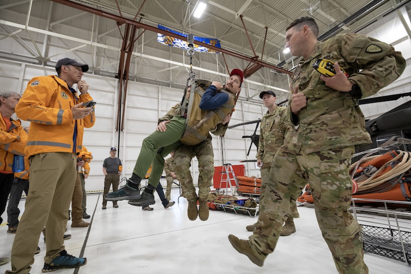 The symposium, hosted by Alaska Army National Guard aviators assigned to Golf Company, 2-211th General Support Aviation Battalion, included U.S. Coast Guard crews assigned to Sector Western Alaska and U.S. Arctic out of Air Stations Kodiak and Sitka, Alaska Air National Guardsmen with the 176th Wing rescue squadrons, U.S. Army aviators from Fort Wainwright’s 1-52nd General Support Aviation Battalion, Alaska State Troopers, and civilian search and rescue professional volunteers from the Alaska Mountain Rescue Group.