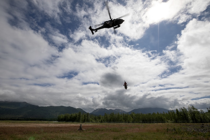 The symposium, hosted by Alaska Army National Guard aviators assigned to Golf Company, 2-211th General Support Aviation Battalion, included U.S. Coast Guard crews assigned to Sector Western Alaska and U.S. Arctic out of Air Stations Kodiak and Sitka, Alaska Air National Guardsmen with the 176th Wing rescue squadrons, U.S. Army aviators from Fort Wainwright’s 1-52nd General Support Aviation Battalion, Alaska State Troopers, and civilian search and rescue professional volunteers from the Alaska Mountain Rescue Group.