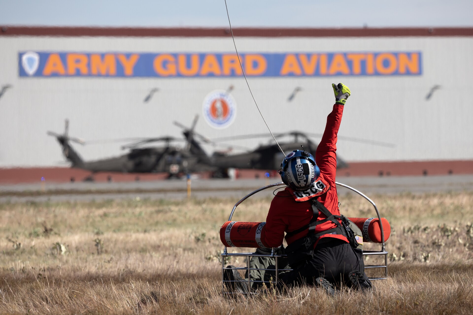 The symposium, hosted by Alaska Army National Guard aviators assigned to Golf Company, 2-211th General Support Aviation Battalion, included U.S. Coast Guard crews assigned to Sector Western Alaska and U.S. Arctic out of Air Stations Kodiak and Sitka, Alaska Air National Guardsmen with the 176th Wing rescue squadrons, U.S. Army aviators from Fort Wainwright’s 1-52nd General Support Aviation Battalion, Alaska State Troopers, and civilian search and rescue professional volunteers from the Alaska Mountain Rescue Group.