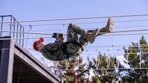 A Republic of Korea Marine with the 1st Marine Division, ROK Marine Corps, demonstrates a rope traversal during the Korean Marine Exercise Program 25.2 in Pohang, South Korea, July 24, 2025.