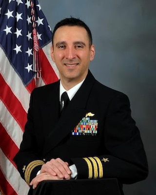 COMMANDER WILLIAM DELAO