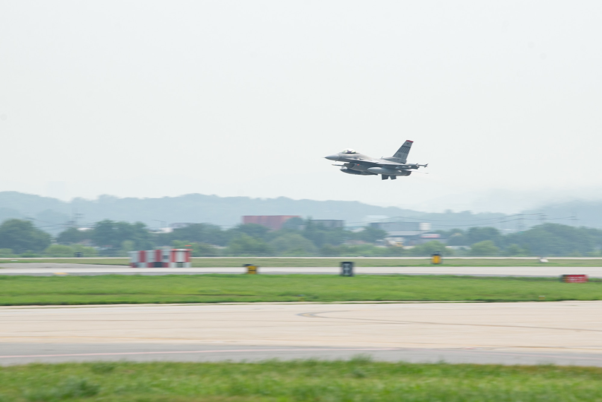 An F-16 takes off.