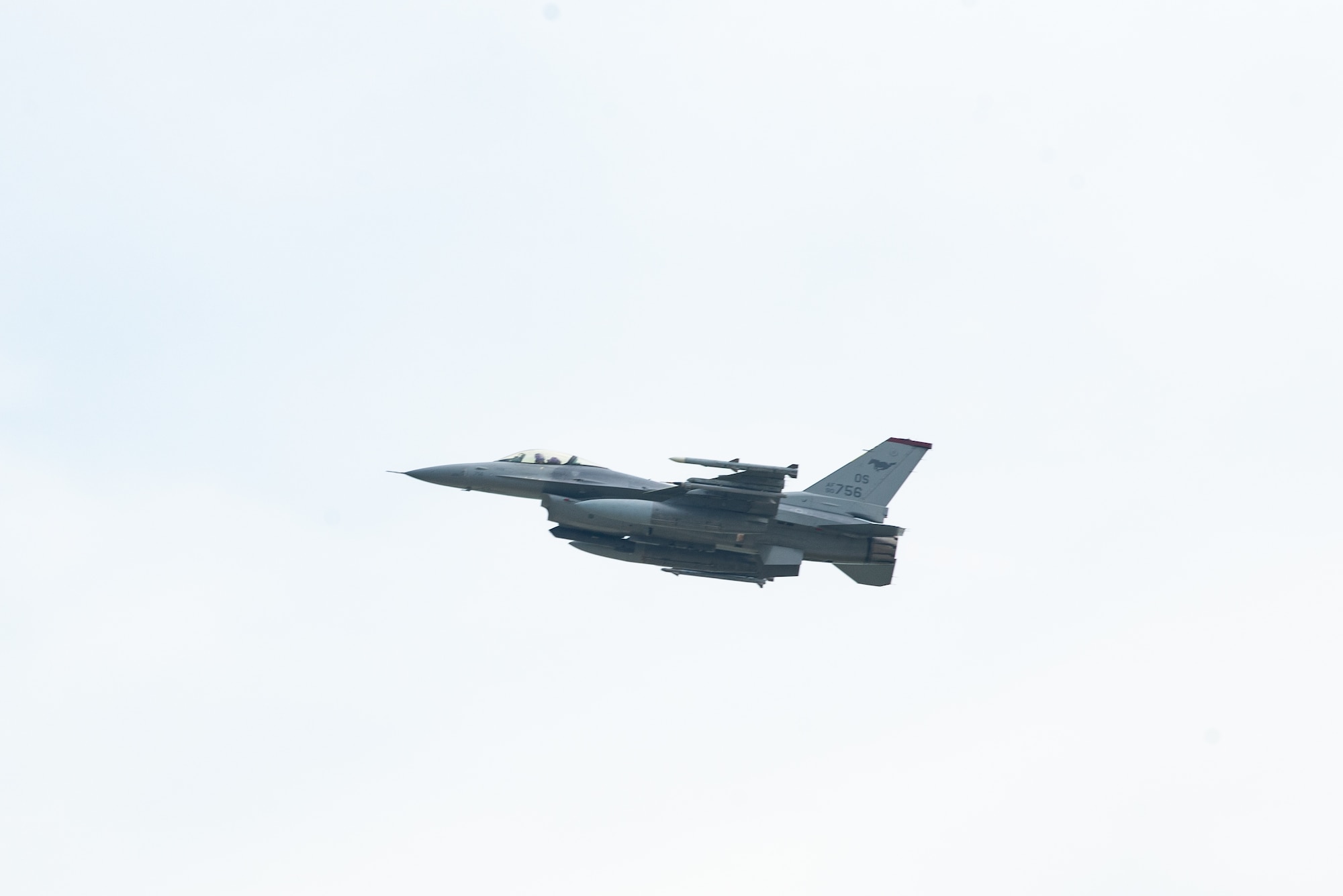 An F-16 flies overhead after takeoff.