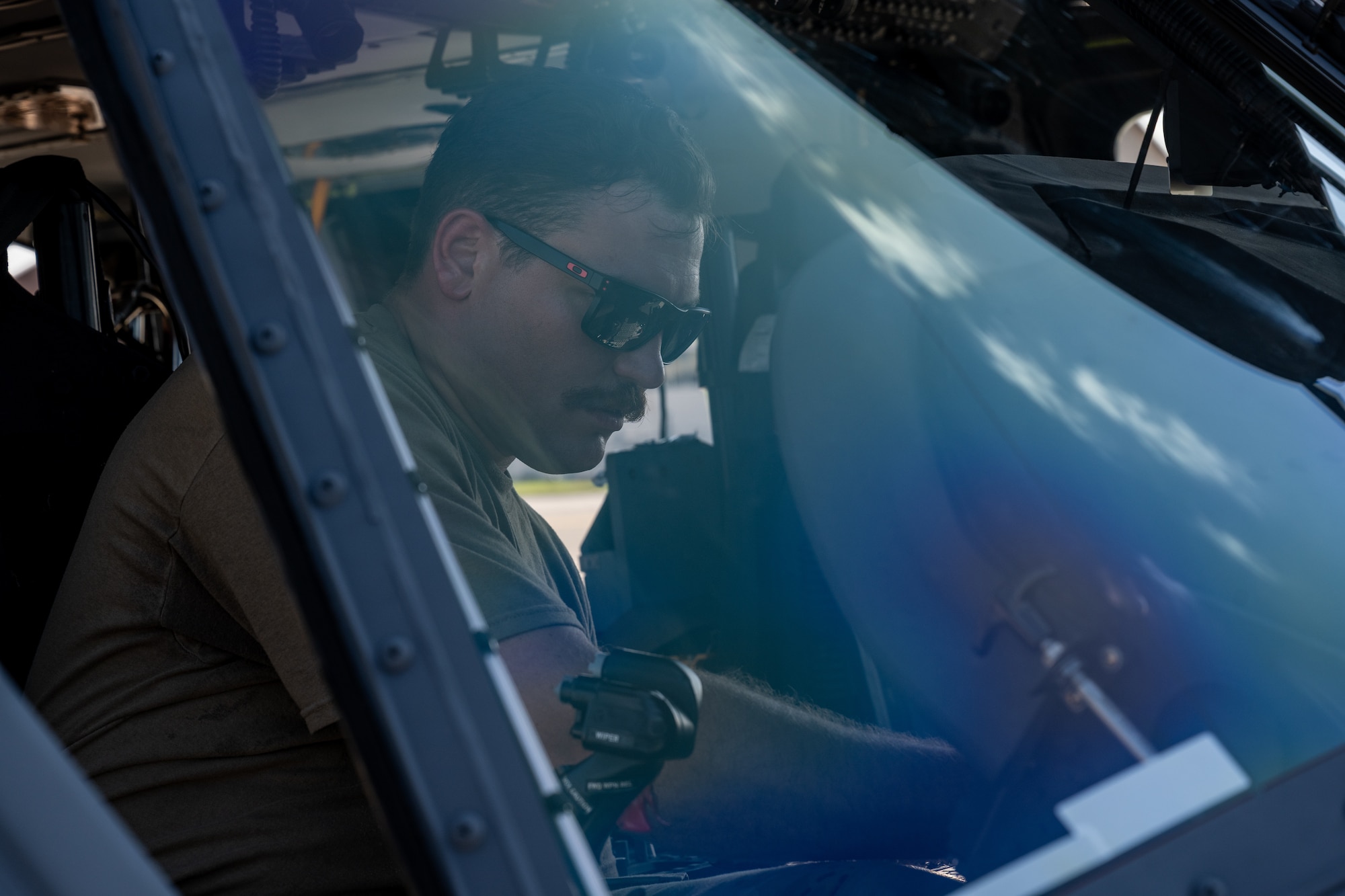 U.S. Air National Guard Senior Airman Brenden Wassmer, 106th Rescue Wing helicopter crew chief, performs an inspection on an HH-60W Jolly Green II during exercise Resolute Force Pacific (REFORPAC) 2025 at Misawa Air Base, Japan, July 16, 2025.