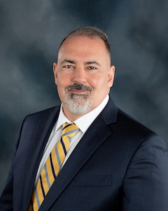 John Bitterman poses for an employee portrait in studio in Baltimore, MD on March 10, 2021.