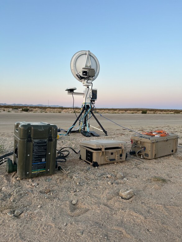 The U.S. Naval Research Laboratory (NRL) developed Hydrogen Small Unit Power (H-SUP) powering communications equipment during field testing at Marine Corps Air Ground Combat Center Twentynine Palms, Cali., May 19, 2025. The H-SUP system is a portable fuel cell electric generator with greater energy per weight than batteries and lower audible and thermal signatures than combustion generators.