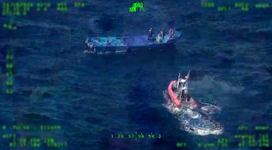 A Coast Guard small boat crew boarding a vessel suspected of drug smuggling operations approximately 120 miles northwest of Ecuador. U.S. Coast Guard Cutter Tahoma’s crew offloaded approximately 9,970 pounds of cocaine worth $73.7 million, Tuesday, at Port Everglades. (Courtesy asset)