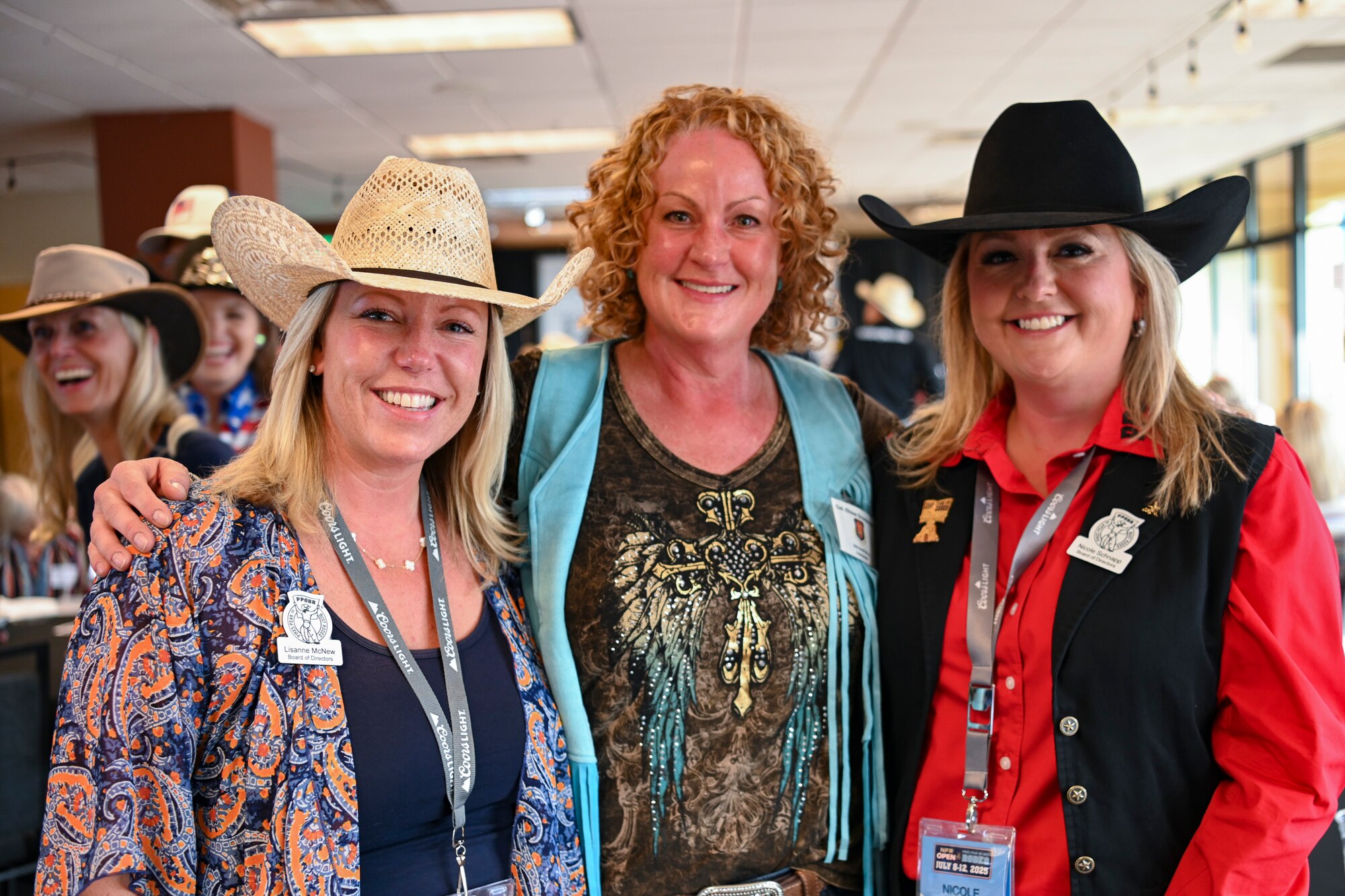 Three women posing for a photo.