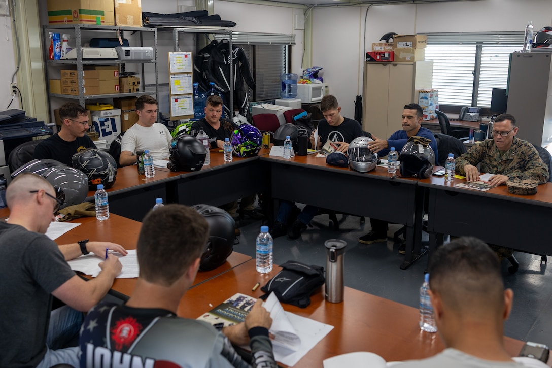 U.S. service members attending the Advanced Riders Course begin class work on Kadena Air Base, Okinawa, Japan, July 21, 2025. The course is mandatory for all Status of Forces Agreement personnel who operate any type of motorcycle. It enhances riders’ proficiency in basic techniques such as leaning, accelerating and braking, while emphasizing road safety through advanced riding instruction for both service members and civilians. (U.S. Marine Corps photo by Lance Cpl. Brody Robertson)