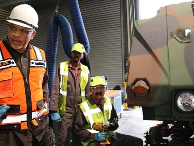 Darren Ratcliff (left) is the director of maintenance at the Dülmen Army Prepositioned Stocks-2 worksite in North Rhine-Westphalia, Germany. The former Soldier for 26 years and now Army civilian for 12 more said being stationed at Dülmen can be challenging but also unique and interesting. (U.S. Army courtesy photo)