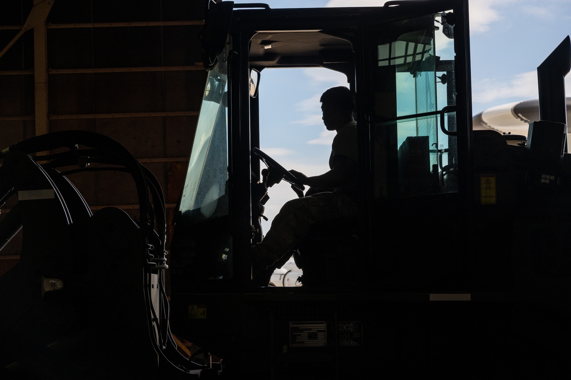 U.S. Air Force Tech. Sgt. Adrian Diaz, 35th Logistics Readiness Squadron air transportation function noncommissioned officer in charge, drives a forklift during exercise Resolute Force Pacific (REFORPAC) 2025