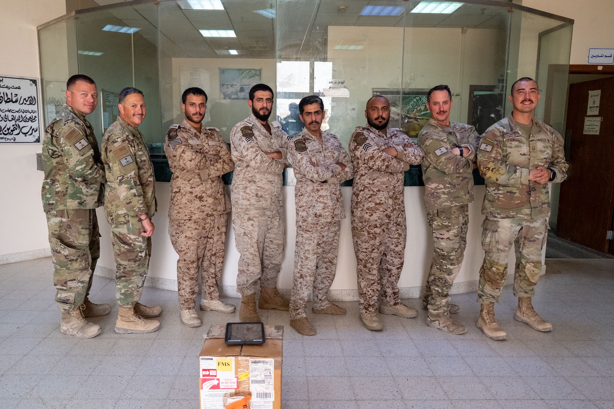 A group of four U.S. Air Force and four Royal Saudi Air Force servicemembers pose for a photo.