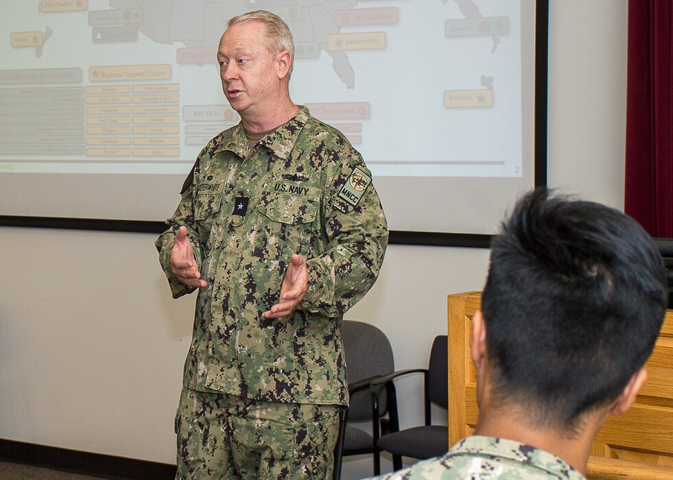 Candid career center comms…Rear Adm. Stuart Satterwhite, MyNavy Career Center commander, addresses Navy leadership, as well as command pay and personnel administrators, during several open all-hand calls at Naval Hospital Bremerton’s Ross Auditorium, as part of fleet engagements across the Pacific Northwest, July 28-29, 2025. Satterwhite shared insight on the current and future status of MyNavy Career Center, fielded questions and provided information covering a variety of administrative topics from pay and entitlement to permanent change of duty orders and personal record updates (Official Navy photo by Mass Communication 2nd Class Jennifer Benedict, public affairs office).
