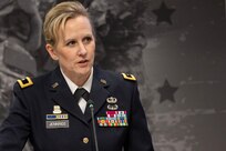 Brig. Gen. Paige M. Jennings, Office of Joint Chiefs of Staff Manpower and Personnel director, delivers remarks during a retirement ceremony for Col. Ralph M. “Mac” Crum, U.S. Army Financial Management Command finance officer, at the Maj. Gen. Emmett J. Bean Federal Center in Indianapolis Nov. 26, 2024. Crum most recently served as USAFMCOM’s chief of staff and served four combat tours during his career. (U.S. Army photo by Brad Staggs)