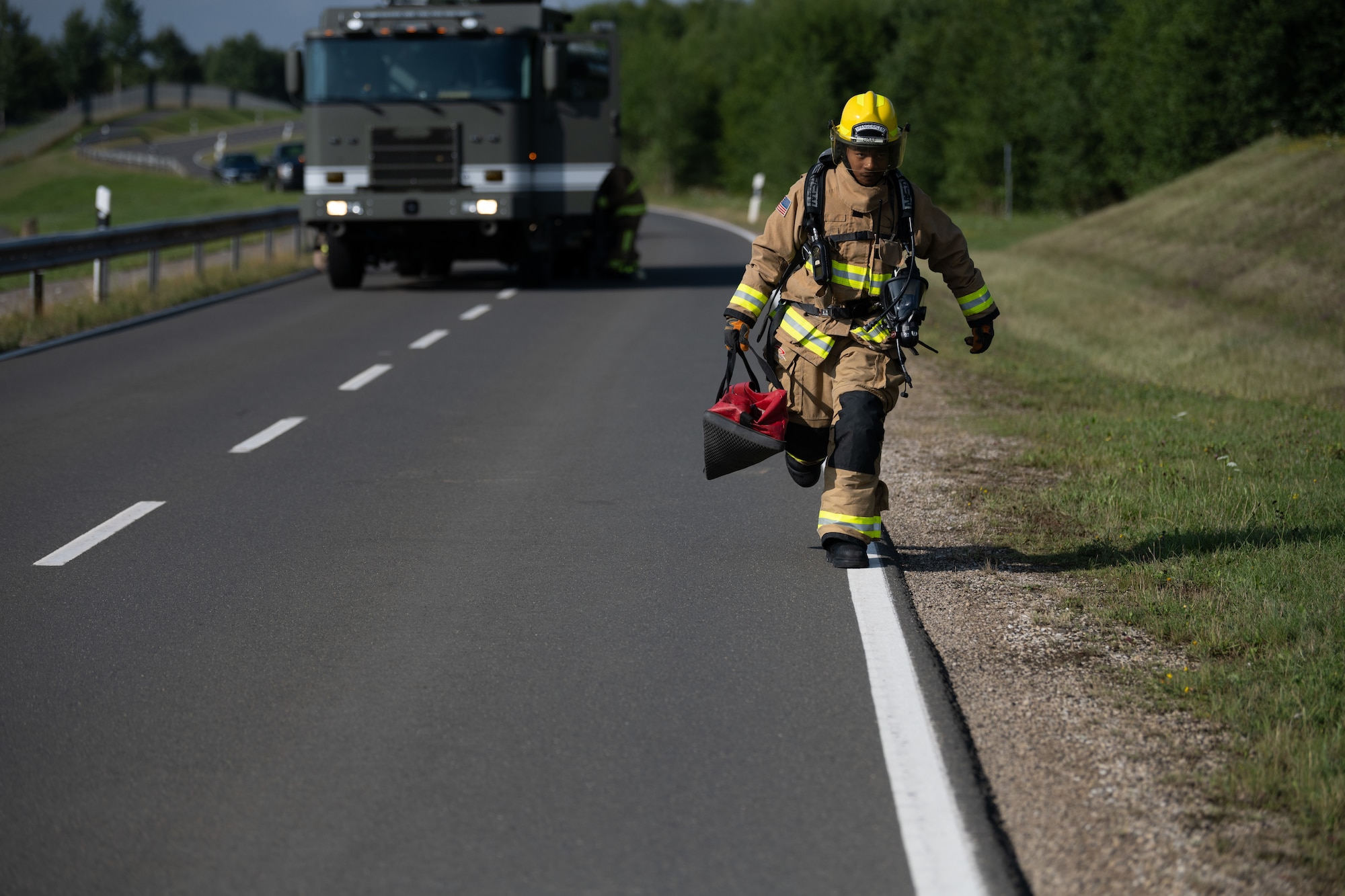 U.S. Air Force Airman 1st Class Juellz Stribling, 52nd Civil Engineer Squadron fire protection specialist, responds to a simulated fuel leak during a Major Accident Response Exercise on Spangdahlem Air Base, Germany, July 30, 2025. During the MARE, first responders were evaluated on their ability to identify, assess and mitigate a range of crisis scenarios.