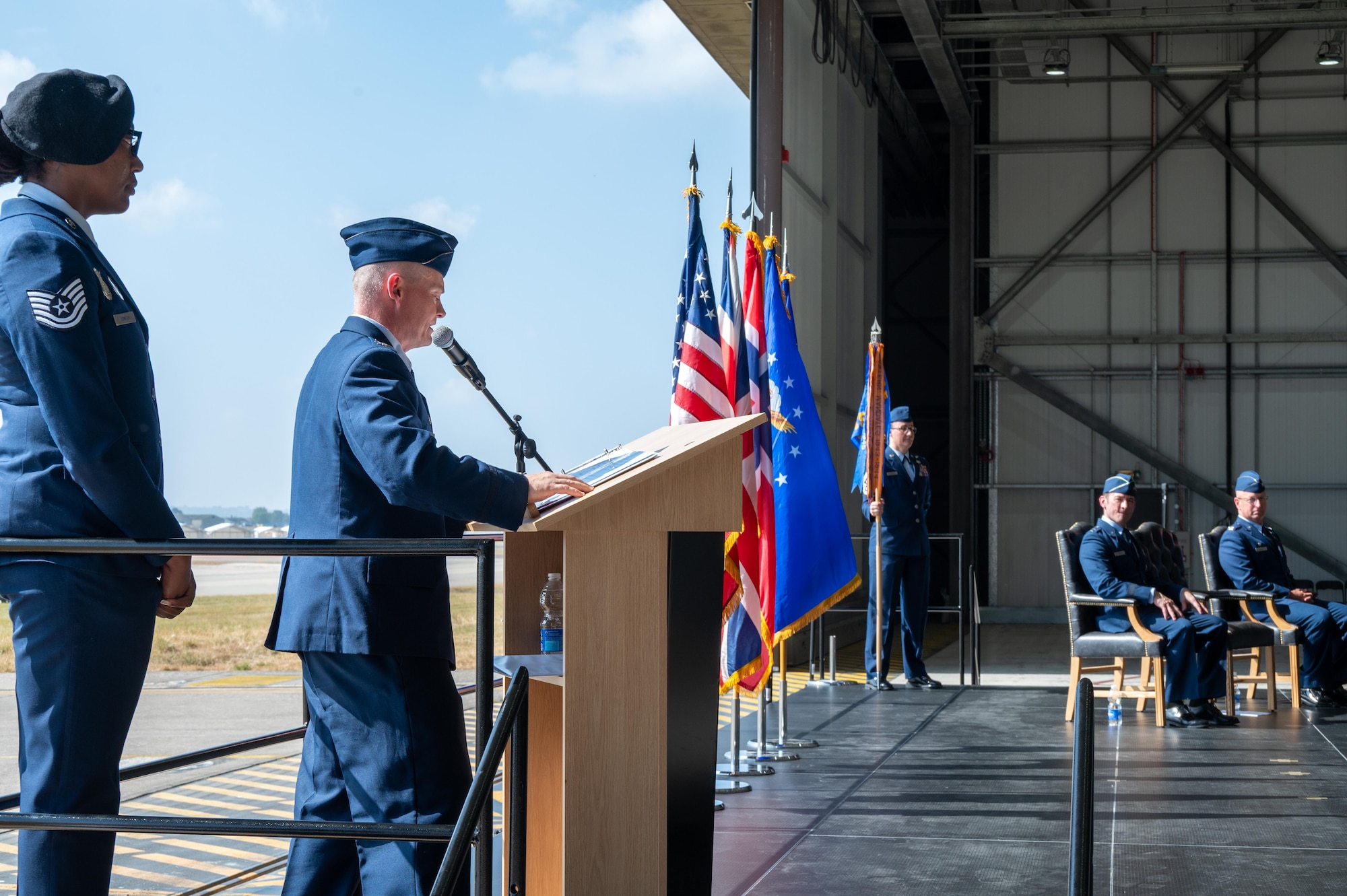 U.S. Air Force Col. D. Landon Phillips, 501st Combat Support Wing (CSW) outgoing commander, delivers remarks