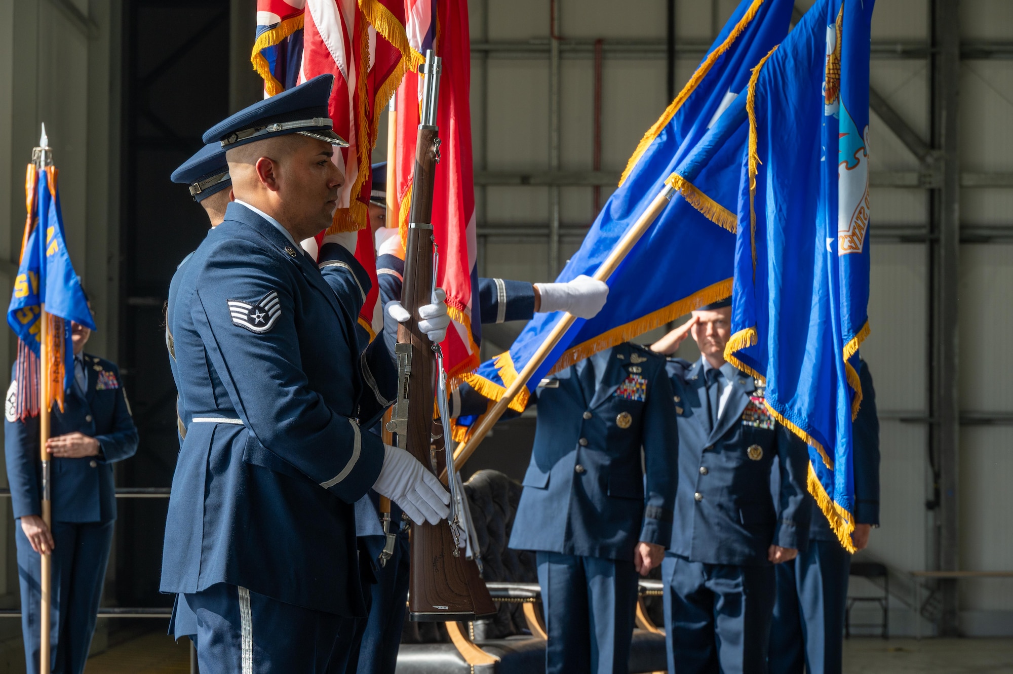 501st Combat Support Wing honor guardsmen present the colors during a change of command ceremony