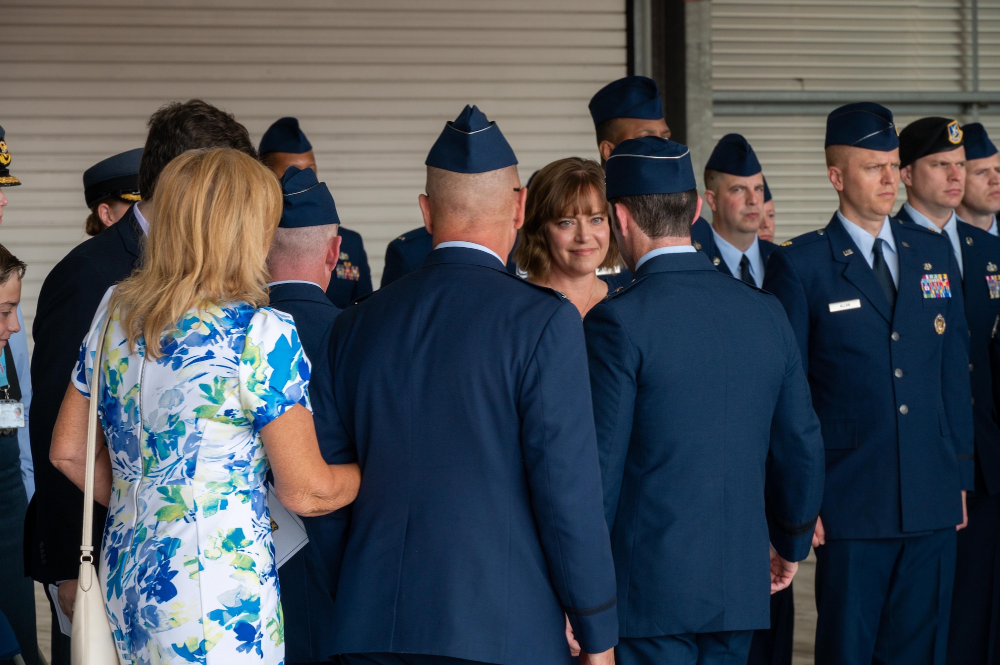 U.S. Air Force Maj. Gen. Paul Moga, Third Air Force commander, greets Mrs. Megan Phillips,