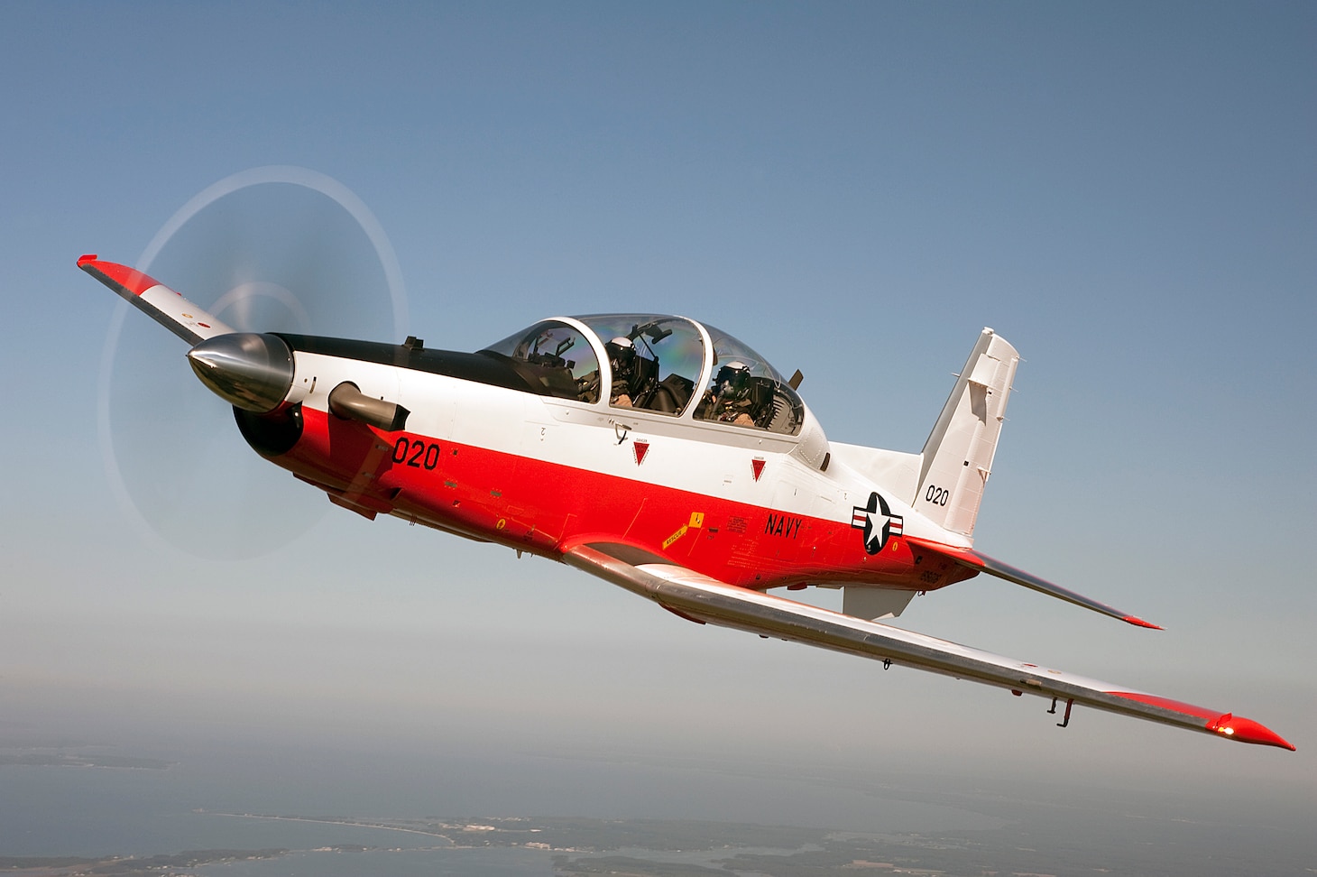 The T-6B Texan II, built by Textron Corporation, is a tandem-seat, turboprop trainer whose mission is to train Navy and Marine Corps pilots and flight officers. USNTPS has been flying the Texan II since 2010.