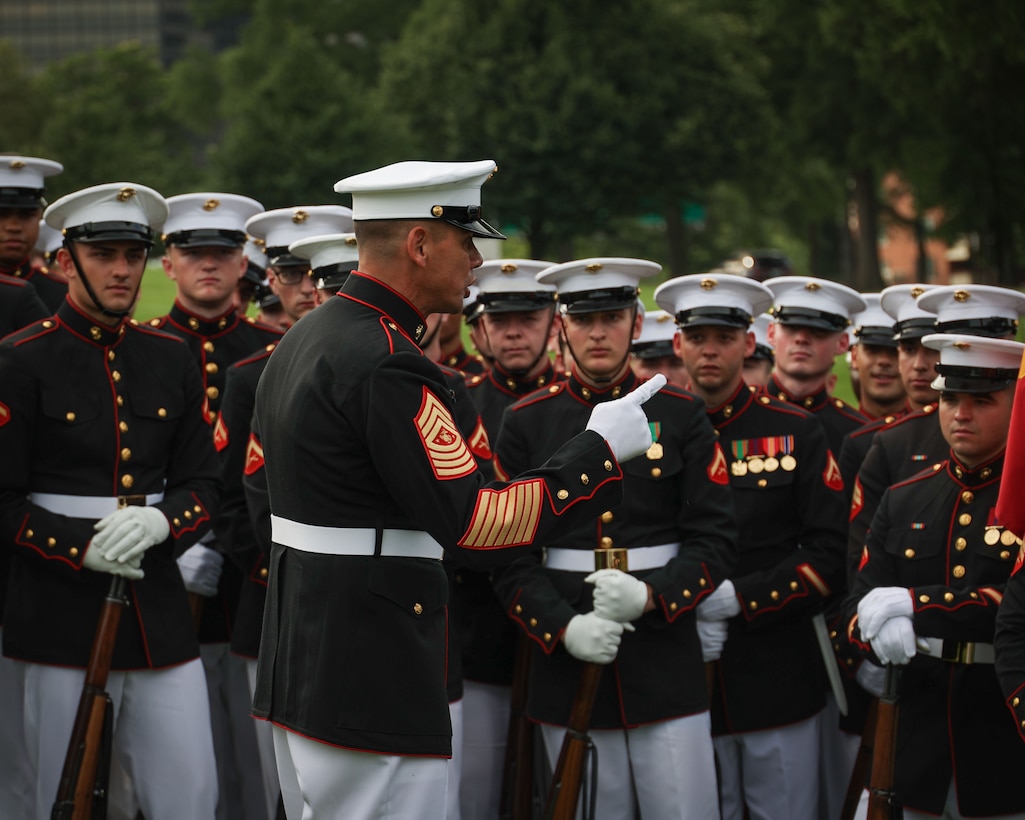 U.S. Marine Corps Sgt. Maj. Carlos A. Ruiz, Sergeant Major of the Marine Corps, delivers a motivating address to Marines of Marine Barracks Washington prior to the start of a Sunset Parade held June 17, 2025, at the United States Marine Corps War Memorial in Arlington, Virginia. The event honored noncommissioned officers throughout the Marine Corps and celebrated the dedication of enlisted leadership. (U.S. Marine Corps photo by Lance Cpl. Brynn L. Bouchard)