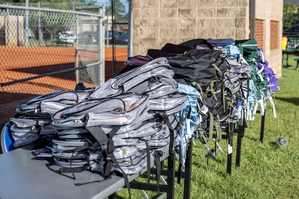 Backpacks were distributed at a BACKpack-to-school Bash.