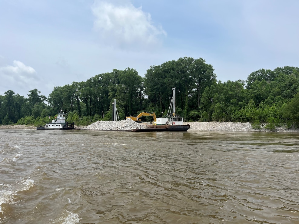 U.S. Army Corps of Engineers Memphis District Project Manager Zach Cook and Project Delivery Team members completed a revetment stone repairs project, July 12, in partnership with Commercial Towing Interests, represented by the Lower Mississippi River Committee, and contractor partner, Midwest Construction Company. 

The $1.5 million channel maintenance project placed 32,400 tons of Grade C Stone to repair two existing revetment locations. Revetment is placed against the banks of the river at locations where mainline levees are threatened or where unsatisfactory alignment and channel conditions are developing. 

Repairs will promote riverbank stability and to help maintain a safe and reliable navigation channel at River Miles 952L and 679.5R.