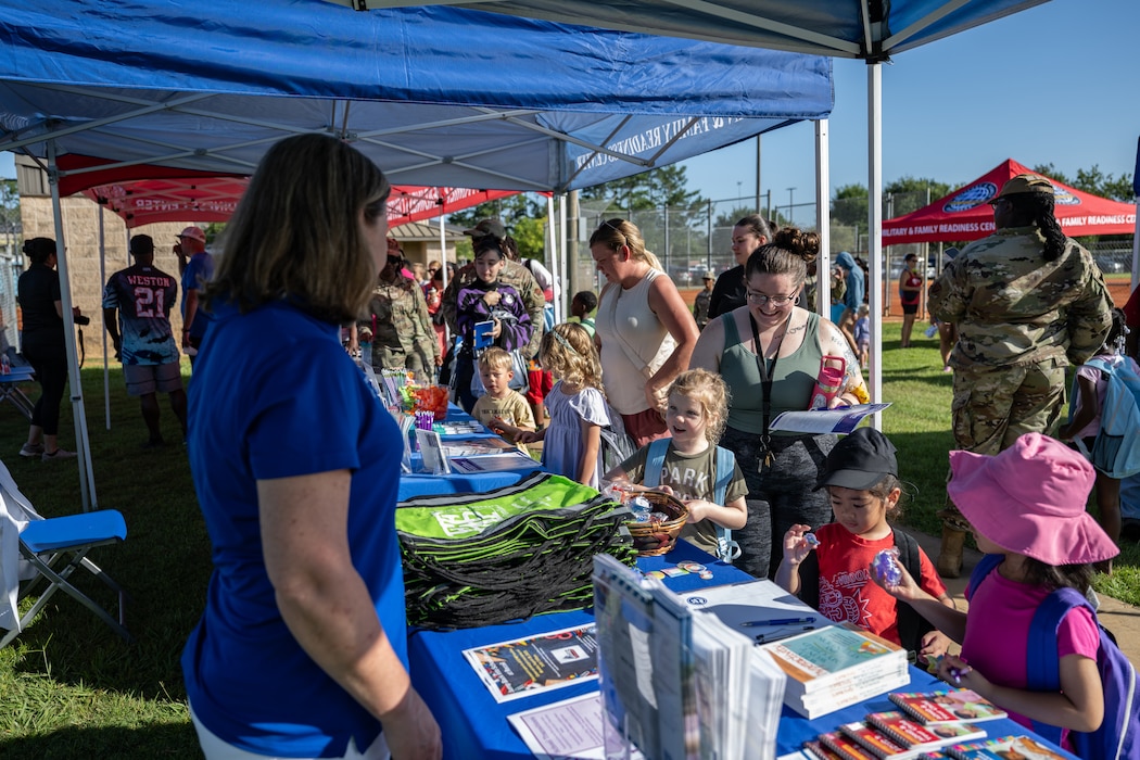 Backpacks were distributed at a BACKpack-to-school Bash.