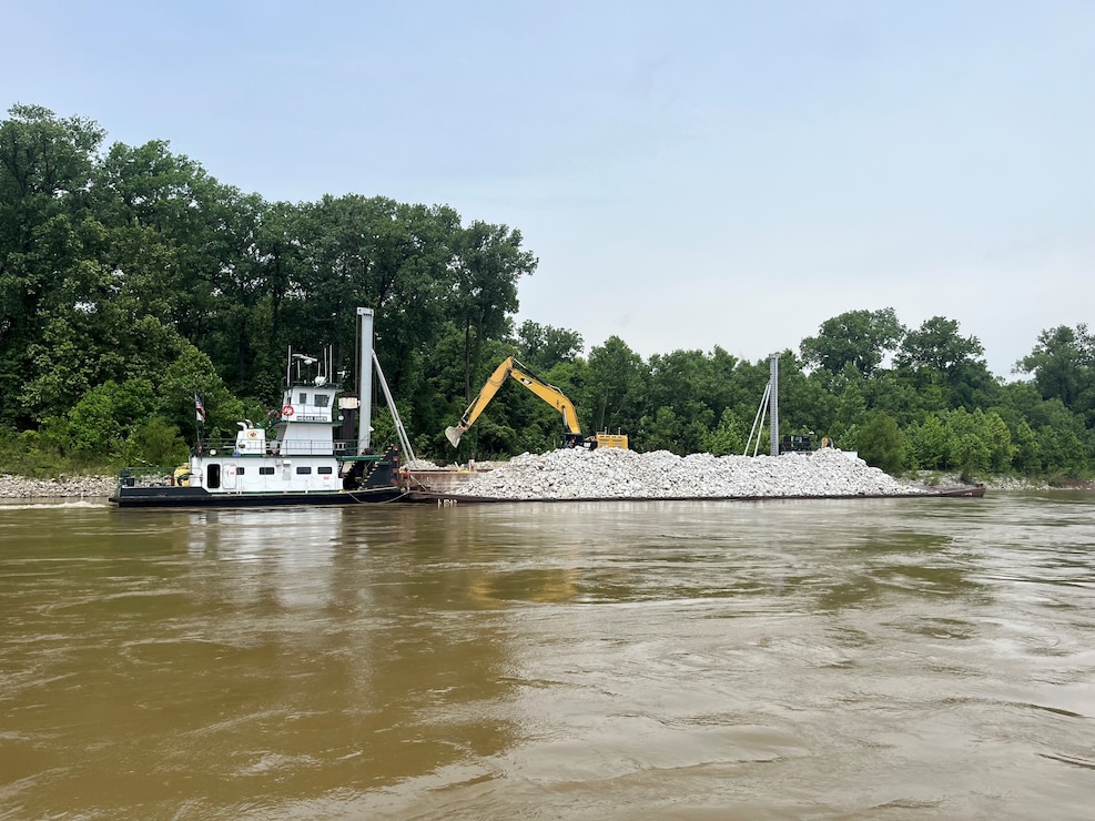 U.S. Army Corps of Engineers Memphis District Project Manager Zach Cook and Project Delivery Team members completed a revetment stone repairs project, July 12, in partnership with Commercial Towing Interests, represented by the Lower Mississippi River Committee, and contractor partner, Midwest Construction Company. 

The $1.5 million channel maintenance project placed 32,400 tons of Grade C Stone to repair two existing revetment locations. Revetment is placed against the banks of the river at locations where mainline levees are threatened or where unsatisfactory alignment and channel conditions are developing. 

Repairs will promote riverbank stability and to help maintain a safe and reliable navigation channel at River Miles 952L and 679.5R.