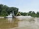 U.S. Army Corps of Engineers Memphis District Project Manager Zach Cook and Project Delivery Team members completed a revetment stone repairs project, July 12, in partnership with Commercial Towing Interests, represented by the Lower Mississippi River Committee, and contractor partner, Midwest Construction Company. 

The $1.5 million channel maintenance project placed 32,400 tons of Grade C Stone to repair two existing revetment locations. Revetment is placed against the banks of the river at locations where mainline levees are threatened or where unsatisfactory alignment and channel conditions are developing. 

Repairs will promote riverbank stability and to help maintain a safe and reliable navigation channel at River Miles 952L and 679.5R.