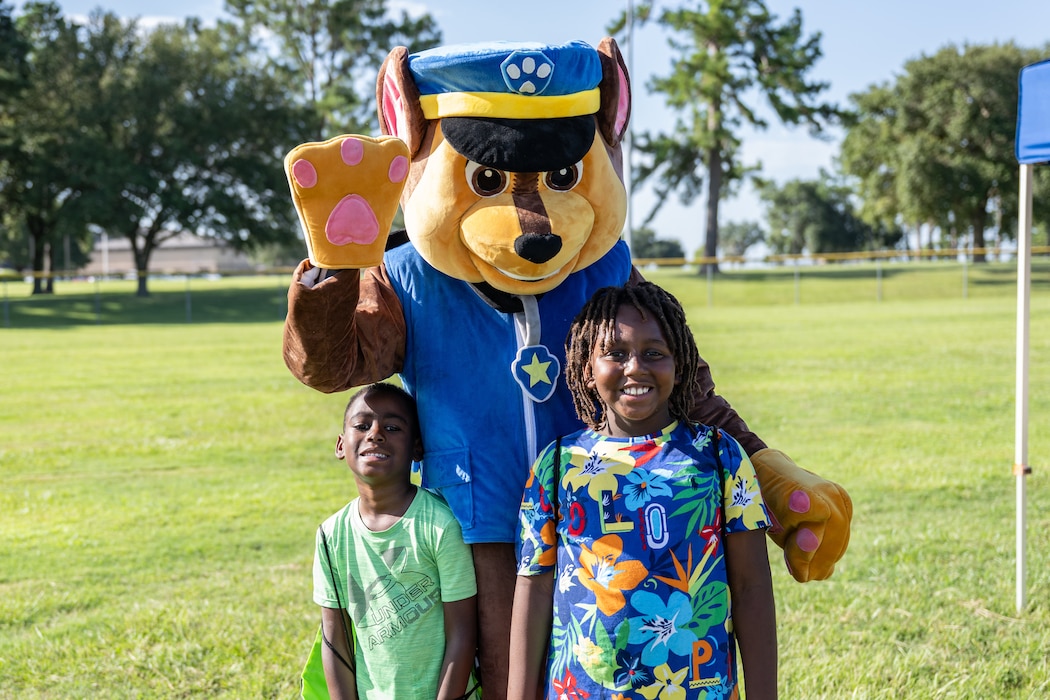 Backpacks were distributed at a BACKpack-to-school Bash.